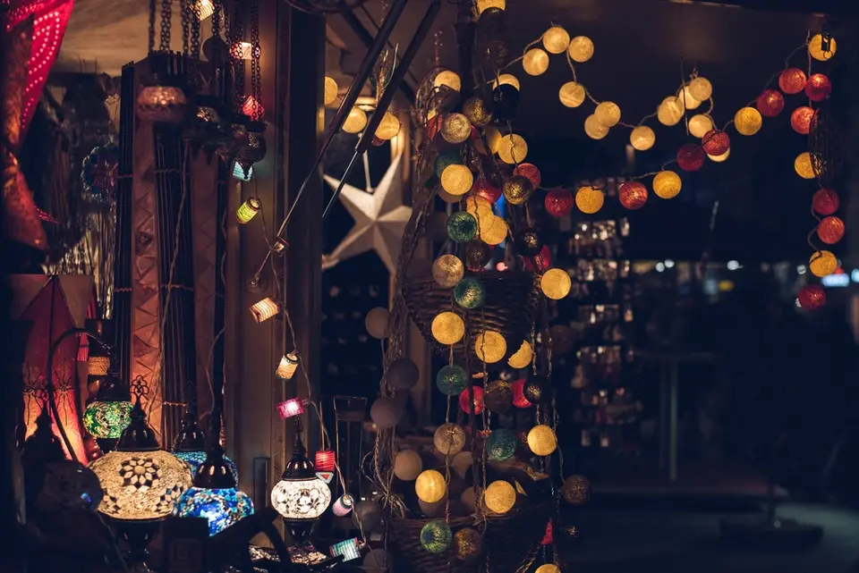 Festive shop lit up with Christmas lights during the busy winter trading season